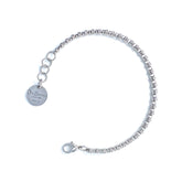 A silver chain bracelet with a round silver charm with the DelBrenna brand name against a white background. The silver bracelet has been handcrafted in Tuscany by DelBrenna Italian Jewelry artisans and designers.